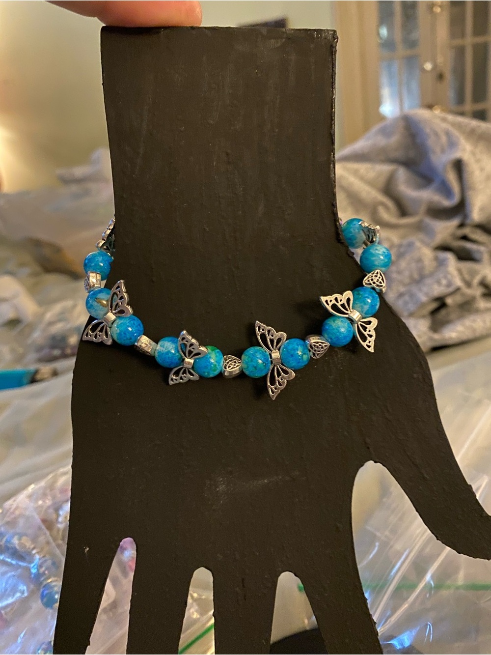 Turquoise Blue Beaded Bracelet with Silver Butterfly Accents